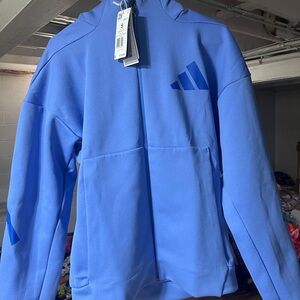 Adidas premier series men’s golf full zip hoodie. New with tags. Size small.